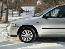 Mazda 323 1997 года