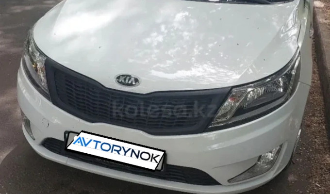 Kia Rio 2014 года