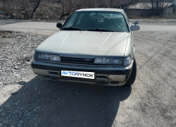 Mazda 626 1990 года
