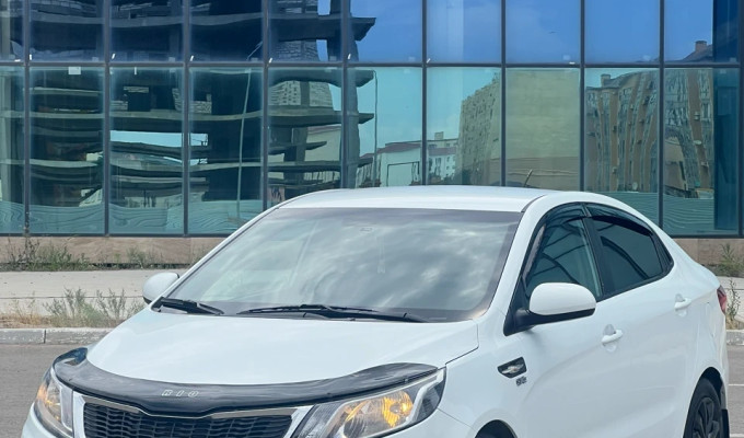 Kia Rio 2014 года