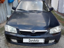 Mazda 323 1999 года