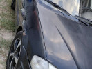Mazda 323 1999 года