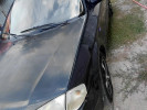 Mazda 323 1999 года