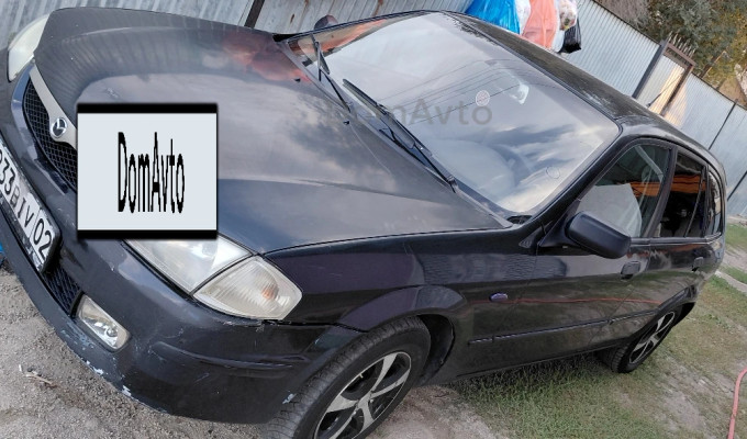 Mazda 323 1999 года