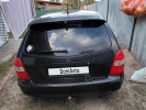 Mazda 323 1999 года