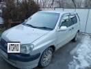 Toyota Raum 1999 года