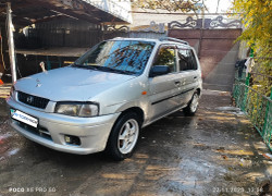 Mazda Demio 1999 года