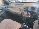 Mazda 323 2003 года