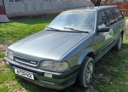 Mazda 323 1990 года