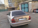 Mazda 323 2003 года
