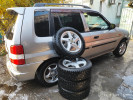 Mazda Demio 1999 года