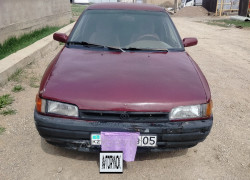 Mazda 323 1993 года
