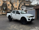 Mitsubishi L200 2012 года
