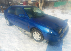 Mazda 323 1990 года