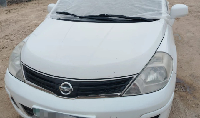 Nissan Tiida 2011 года