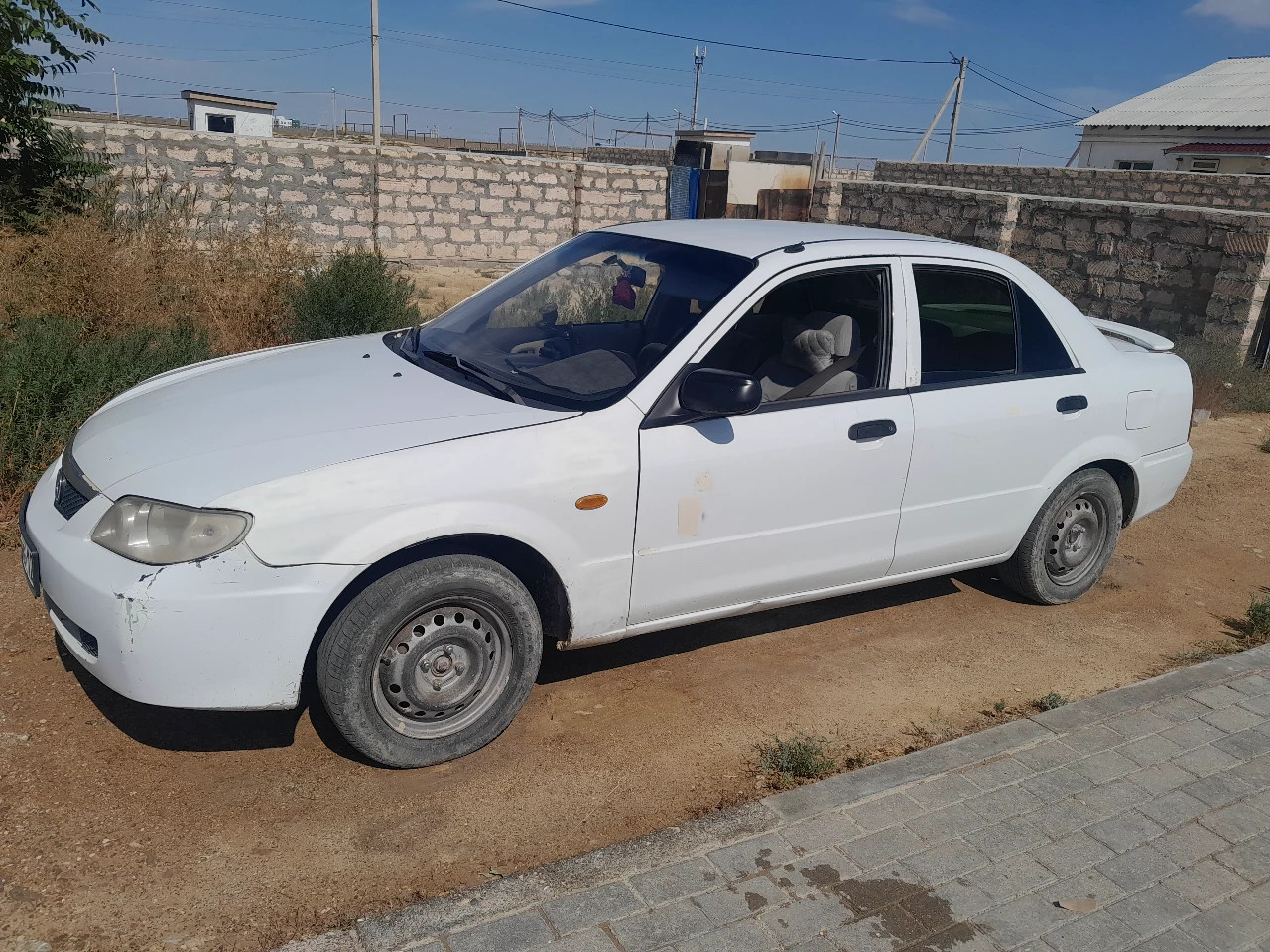 Mazda 323, 2003