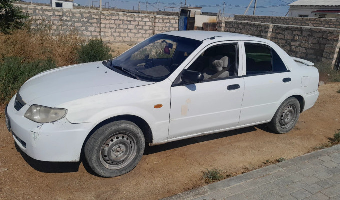 Mazda 323 2003 года