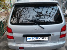 Mazda Demio 1999 года